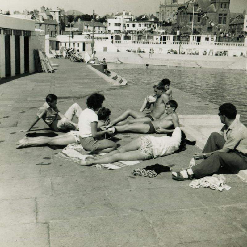Young people relaxing at Jubilee Pool