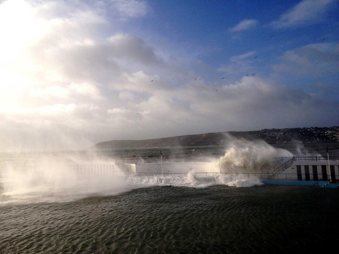 Wave breaching Jubilee Pool wall