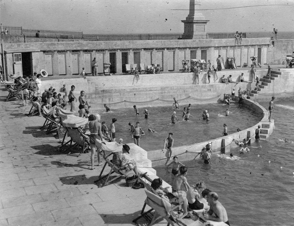 Children's pool, people in deck chairs