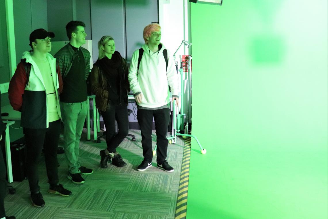 Penwith College Media Diploma students looking round Falmouth University School of Film and TV in a green screen studio