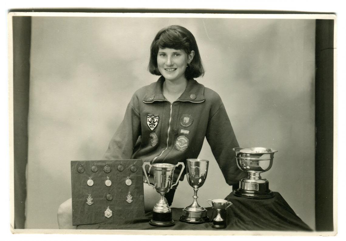 Ruth Trevenen with swimming cups and medals