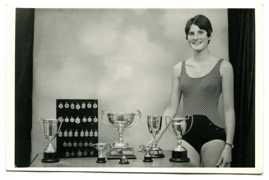 Ruth Trevenen with swimming cups and medals